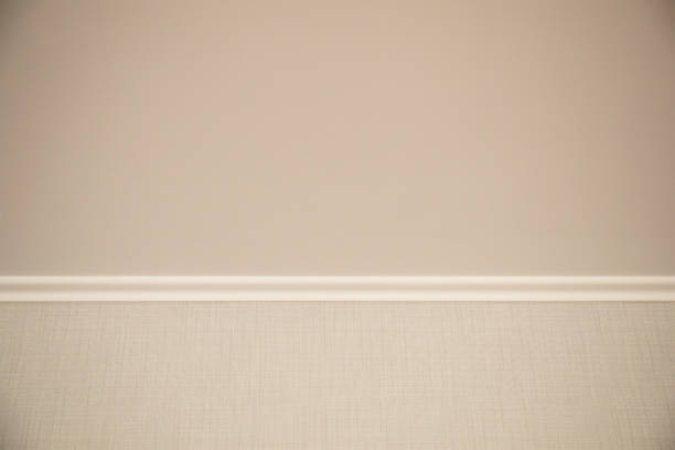White ceiling molding. Part of room interior close up