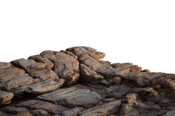 istock A sunlit rock cliff isolated against a white background. 2194706656