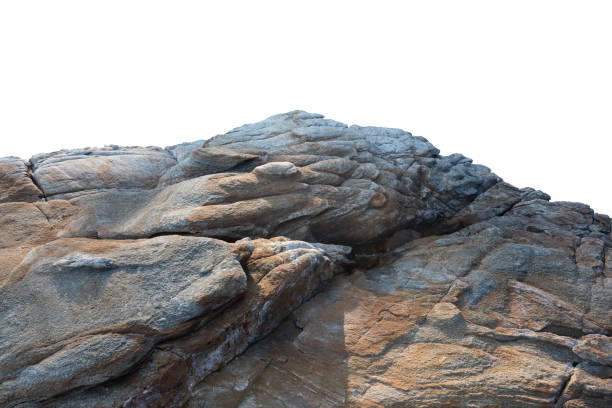 istock A sunlit rock cliff isolated against a white background. 2194706663