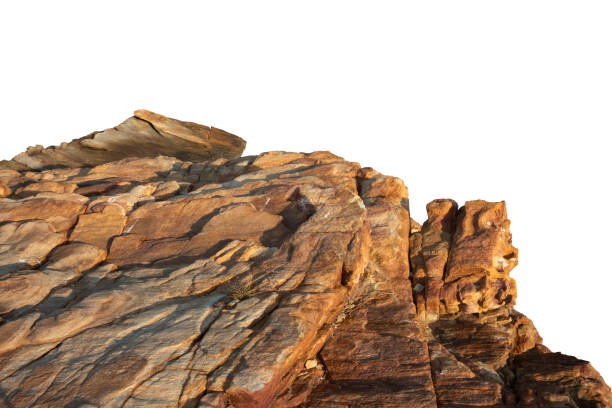 istock A sunlit rock cliff isolated against a white background. 2194706664