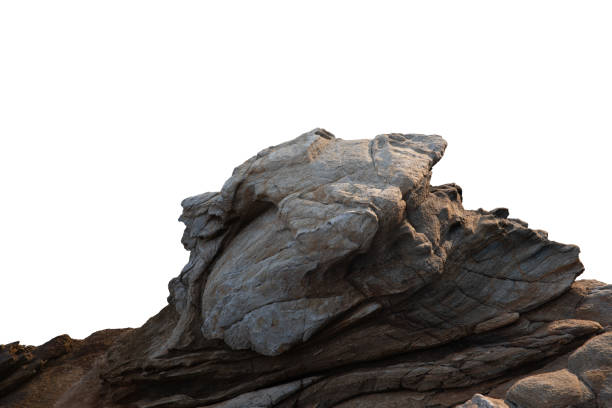 istock A sunlit rock cliff isolated against a white background. 2194706681