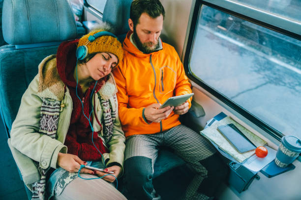 istock Couple traveling with train 2194706982