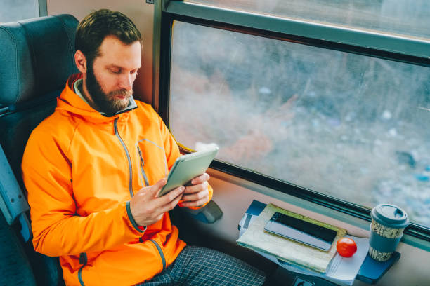 istock Man travelling in Europe with train 2194707094