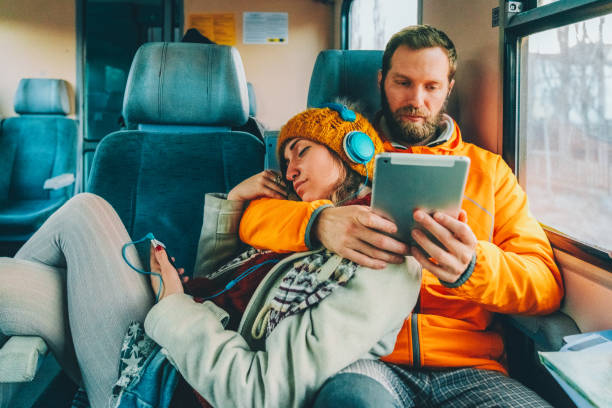 istock Couple traveling with train 2194707163