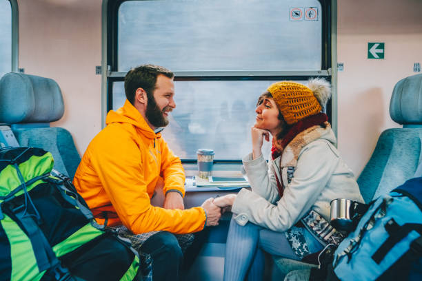 istock Couple traveling in train 2194707584