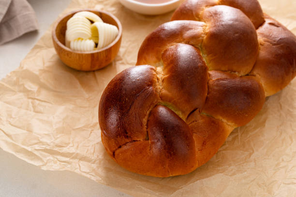 istock Homemade sliced challah bread with butter and honey 2194717764