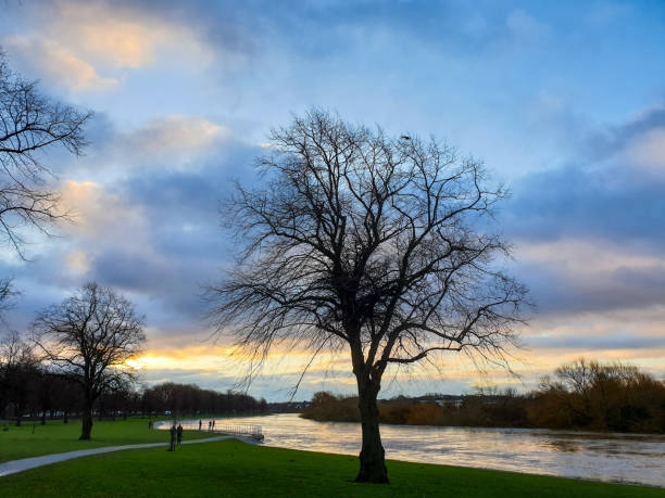 Sunset on a flooded river Trent in Nottingham, UK.