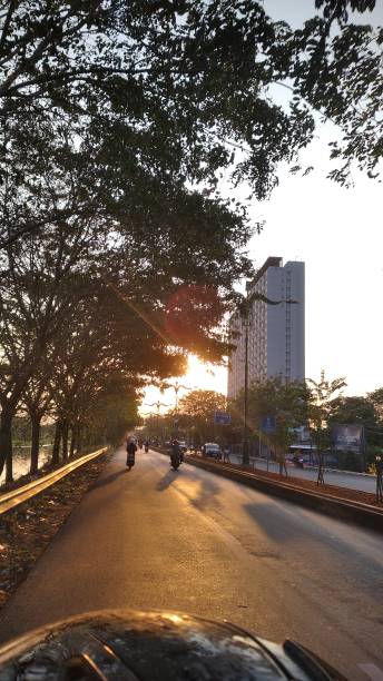 istock sunset view in the afternoon on road 2194718809
