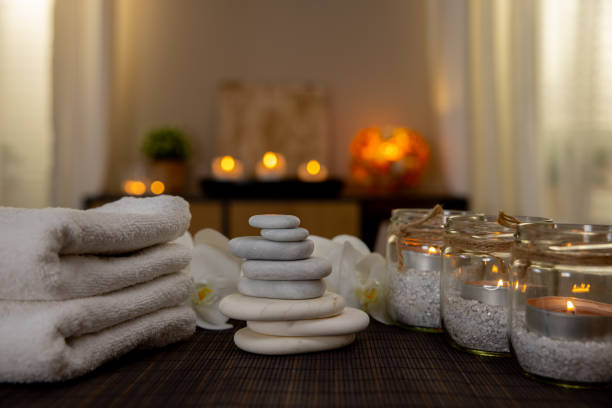 istock A tranquil spa setting illuminated by soft candlelight and smooth stones, inducing serenity 2194719228