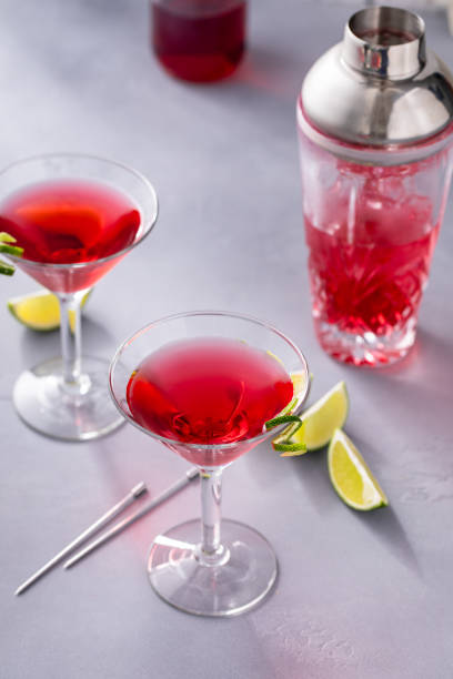 istock Martini cocktail with cranberry juice garnished with lime twist 2194719615