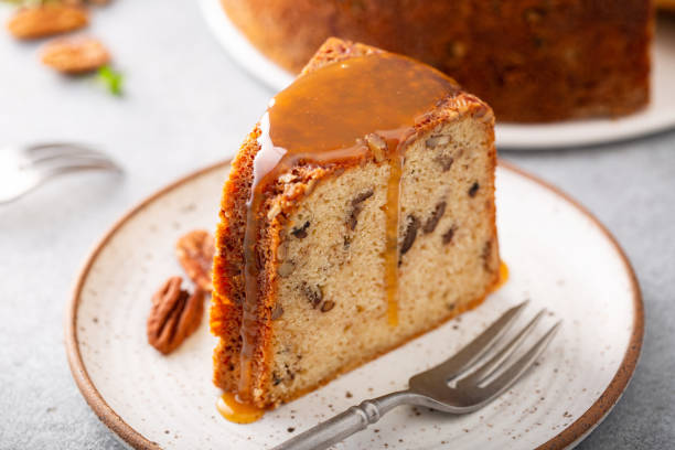 istock Pecan caramel pound cake baked in a bundt pan slice on a plate 2194719674