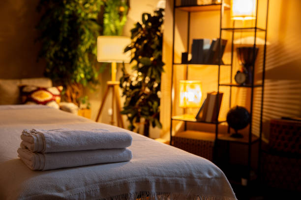 istock Experience the Serene and Tranquil Spa Interior Featuring Soft Towels and a Cozy Ambiance 2194723016