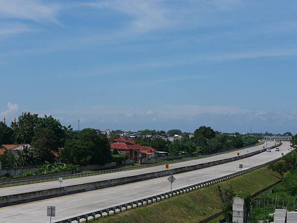 istock An empty toll road as people travel home for Eid. 2194724020