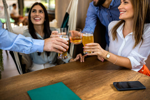 istock Group of friends toasting in a restaurant with alcohol. 2194724682