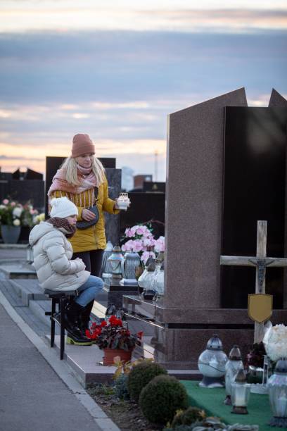 istock Visiting the grave of a cherished loved one at dusk can be a deeply emotional experience 2194725150
