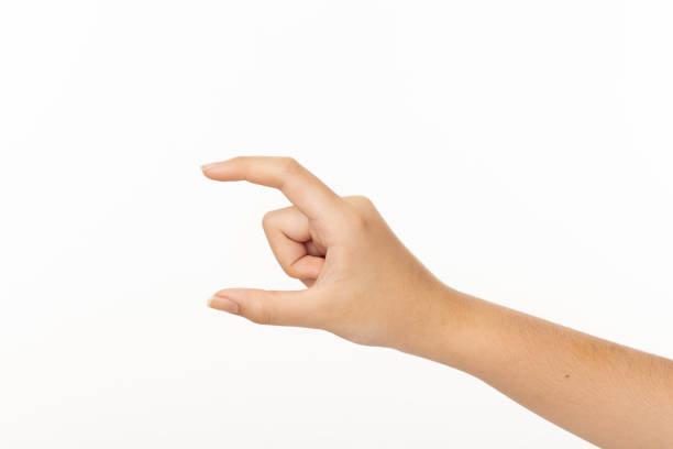 istock Close up man hand picking something isolated on a white background 2194727008