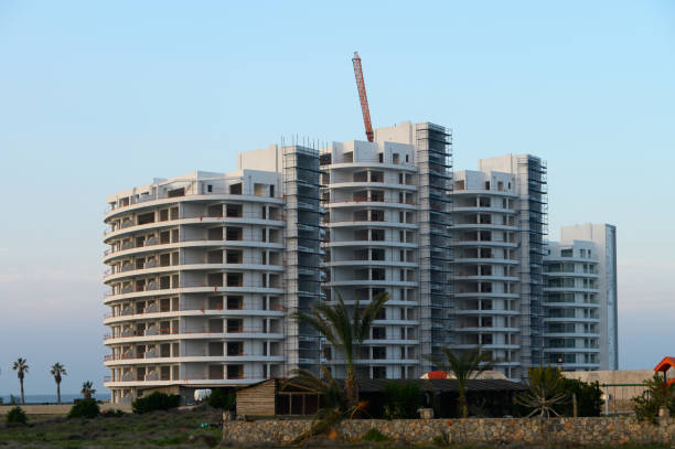 istock Modern residential building under construction near the coast at sunset 2194728210