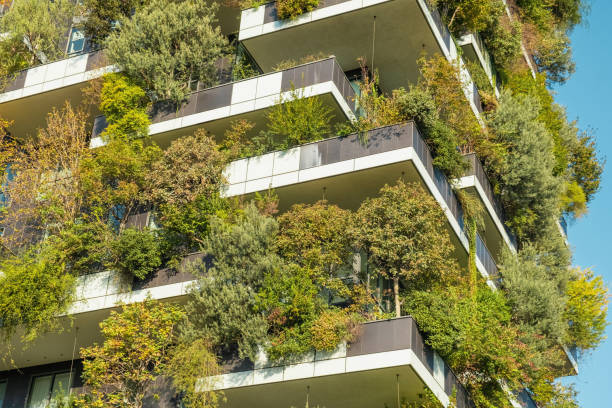 istock Close up of vertical forest building with lush greenery and trees integrated into modern architecture, Milan, Italy. Vertical garden and landscaping, innovative architecture, urban sustainability 2194729461