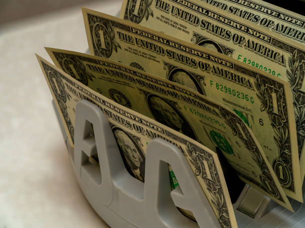 istock Currency displayed in a holder on a table in an indoor setting 2194729881
