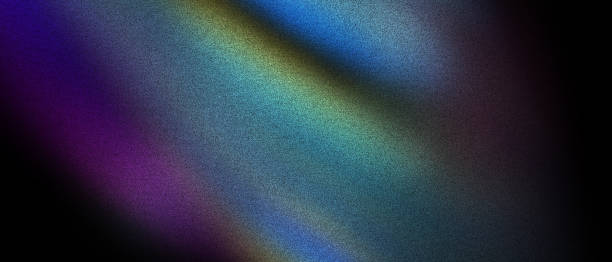 istock Colorful abstract gradient with noise grainy texture on dark background 2194730426