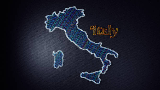 Intricate embroidered map of Italy. Colorful threads highlight the boundaries country and the word Italy on a fabric background.