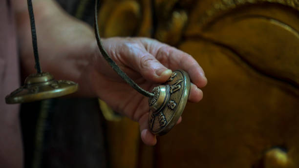 istock Hands playing tibetan cymbals, creating soothing sounds for meditation 2194731458