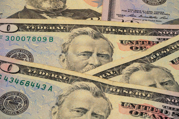 istock Detailed view of US dollar bills featuring historical figures 2194732787
