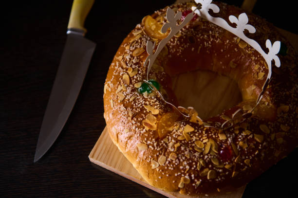 istock Traditional pastry cake with a crown decoration on a wooden surface 2194733343