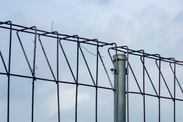 istock Iron fence with blue sky background 2194734940