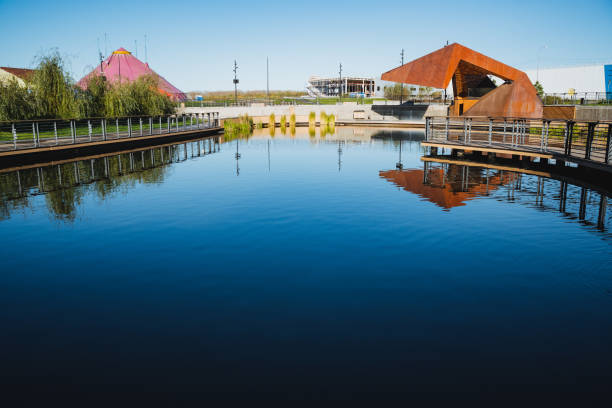 istock A stunning scenic view showcasing modern architecture that is beautifully reflected in the calm waters, creating a picturesque landscape 2194736130