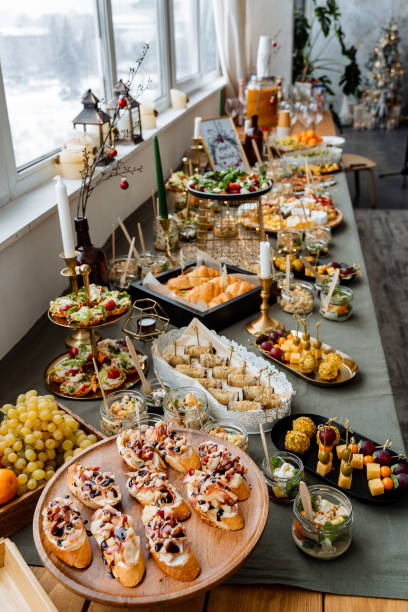 istock The beautifully and elegantly set dining table presents an enticingly tempting variety of delicious and appetizing foods thoughtfully tailored to satisfy a wide range of diverse tastes 2194738975