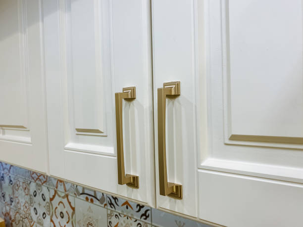 istock This is a close up view of a beautifully designed kitchen cabinet featuring elegant gold handles that add a touch of sophistication and style to the overall decor of the kitchen 2194740351