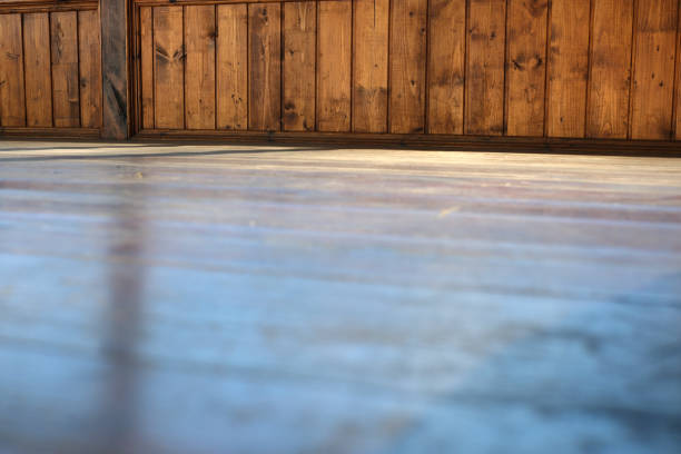 Soft light streams across a beautifully polished wooden floor, creating warmth.
