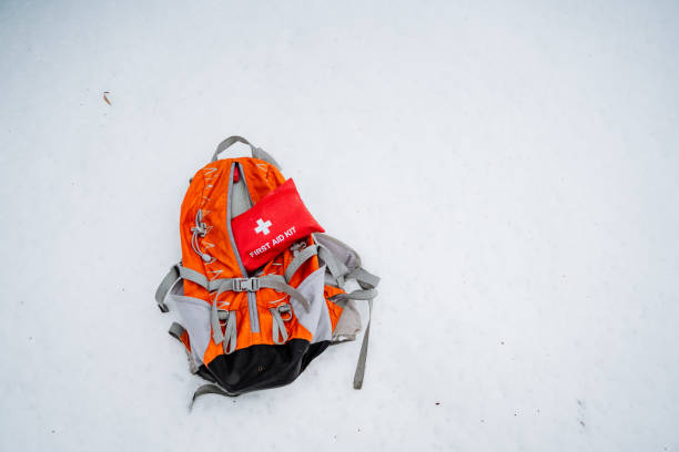 istock In a stunning winter landscape, a backpack equipped with a first aid kit is placed delicately in the untouched snow, emphasizing the essential role of safety in various outdoor activities 2194743529
