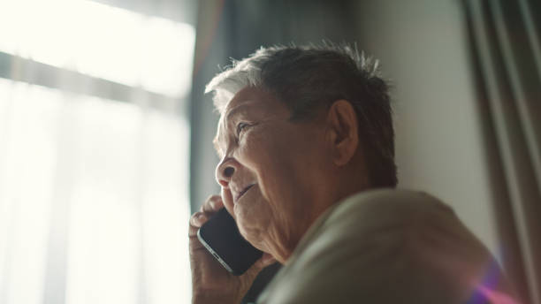 istock Senior woman talking on phone. 2194745315