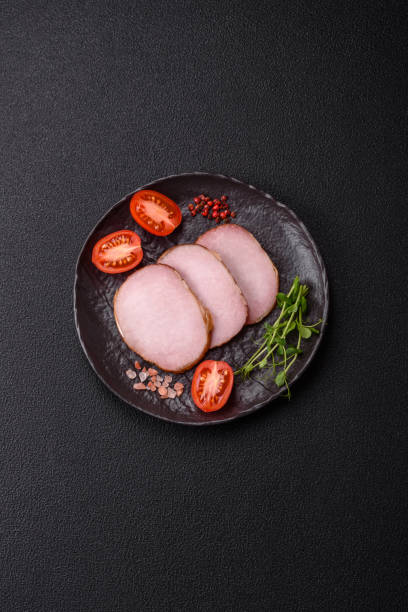 istock Meat, smoked, ham sliced with salt, spices and herbs 2194745807