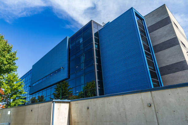 istock Modern Blue Industrial Building Against Clear Sky 2194749039