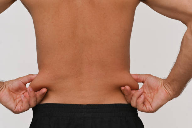 istock fat deposits of a man on side 2194749418