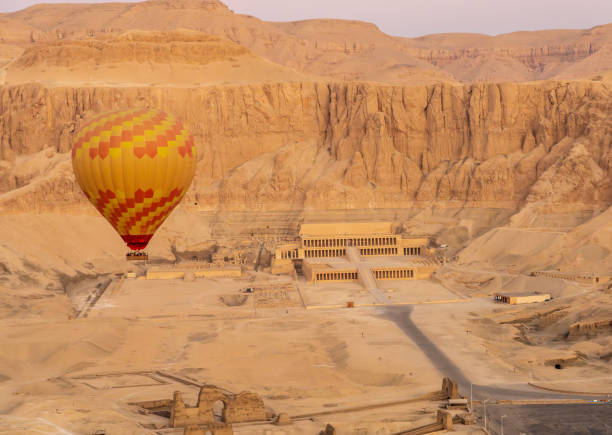 istock Hot air balloon in sunrise flight in Luxor, Egypt 2194749870