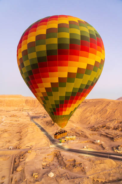 istock Hot air balloon in sunrise flight in Luxor, Egypt 2194750109