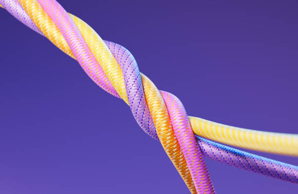 istock Colorful Paracords On Purple Background - Diversity And Multiculturalism Concept 2194756693