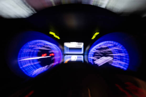 istock blur motion inside car light trail represent moving car or drunk driver 2194761059