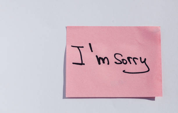 istock Pink sticky note with handwritten 'I'm Sorry' message 2194761244