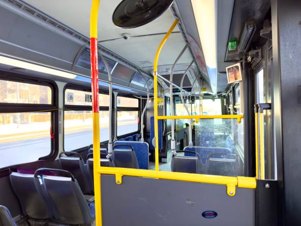 istock interior of empty city bus with blue seats 2194766464
