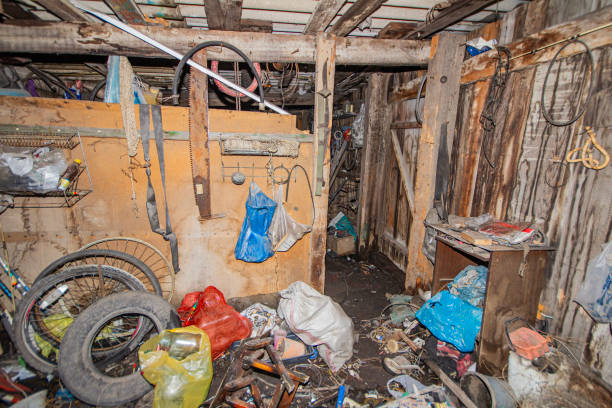 istock big mess in the garage of junk and unnecessary things left when selling the container, big profit when buying a rental place 2194767617