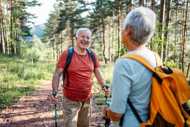 istock Happy senior man on hiking in the forest 2194768244