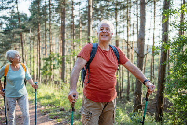 istock Happy senior man on hiking in the forest 2194768417