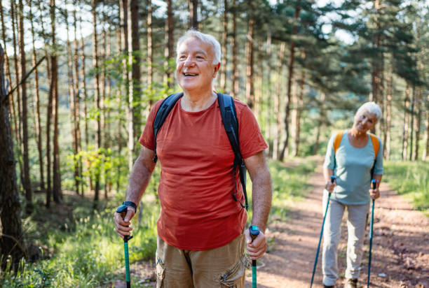istock Happy senior man on hiking in the forest 2194769187