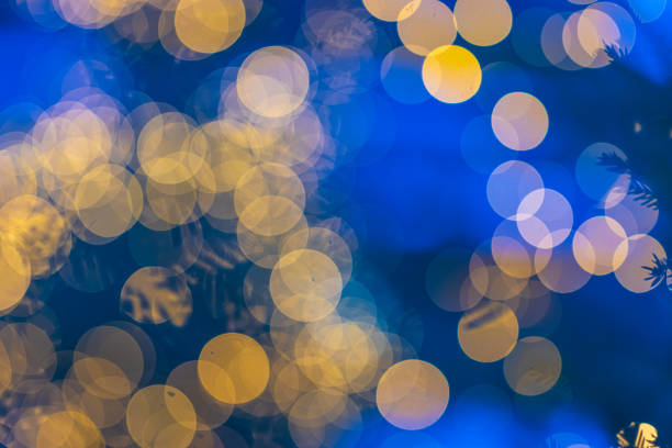 istock Out of focus christmas lights in blue evening light. 2194771911