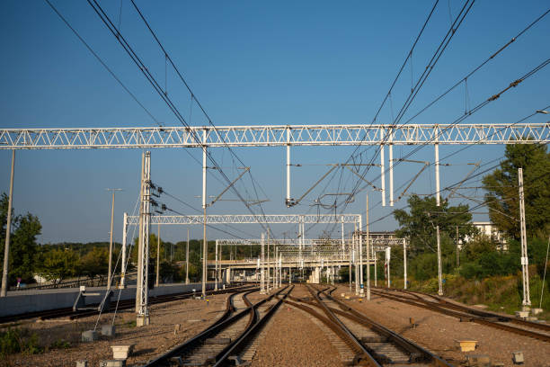 istock Railway Tracks with Overhead Power Lines 2194772925